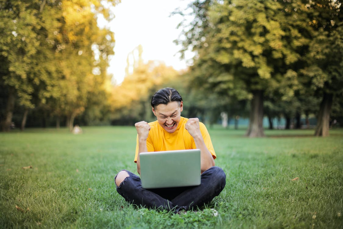 happy guy because he learned something about productivity tips